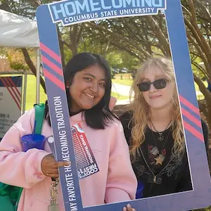 2 female student in CSU t-shirts